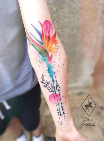 Tatuaje de Flor multicolor acuarela realizado por Jason Adelinia tatuaje realizado por Jason Adelinia