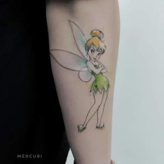 Tatuaje de campanita realizado por Michele Mercuri tatuaje realizado por Michele Mercuri