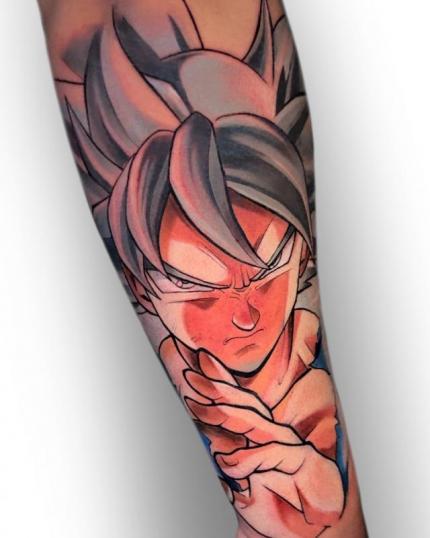 Tatuaje de Ultra instinto de Goku realizado por Gerardo Valerio tatuaje realizado por Gerardo Valerio