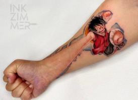 Tatuaje de Monkey D. Luffy en One Piece realizado por Alice Peri tatuaje realizado por Alice Peri
